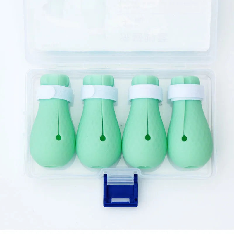 Green silicone cat anti-scratch gloves covering hands and lower arms for pet protection