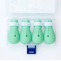 Green silicone cat anti-scratch gloves covering hands and lower arms for pet protection