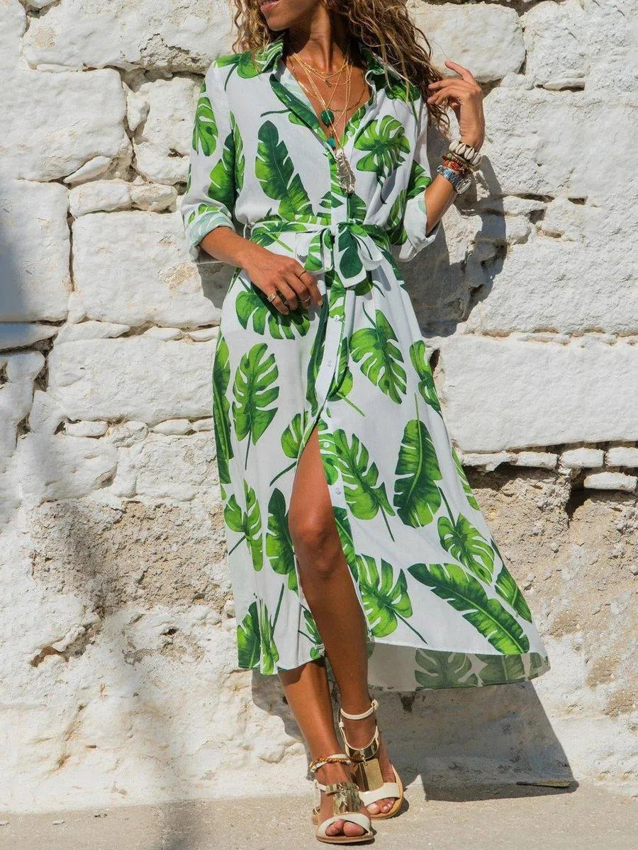 Women's vintage-inspired chiffon A-line dress with V-neck, high waist, and printed pattern.