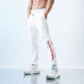 Men's black ankle-tied sweatpants with mid-waist design and polyester-spandex fabric