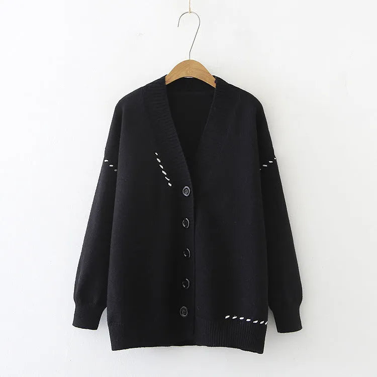 Women's knitted cardigan top coat in black solid colour with long sleeves and loose fit