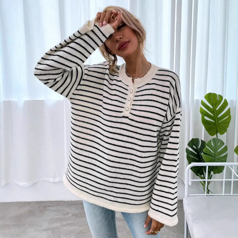 Black and white striped women's casual top with contrast colour detailing and drop-shoulder sleeves