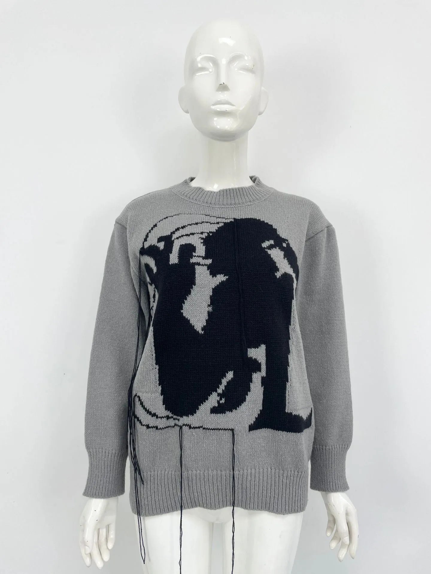 Women's grey alpaca wool sweater with abstract tassel design and round neck