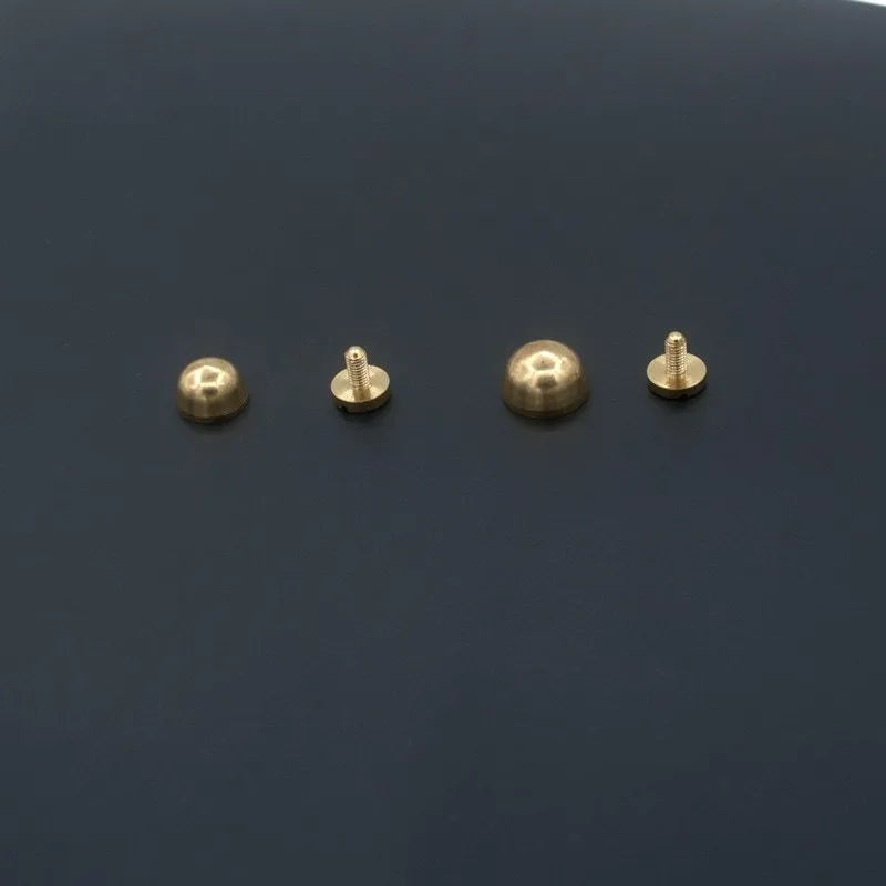 Brass decorative buckles showing round and bucket foot nail designs in 10x6mm and 12x7mm sizes