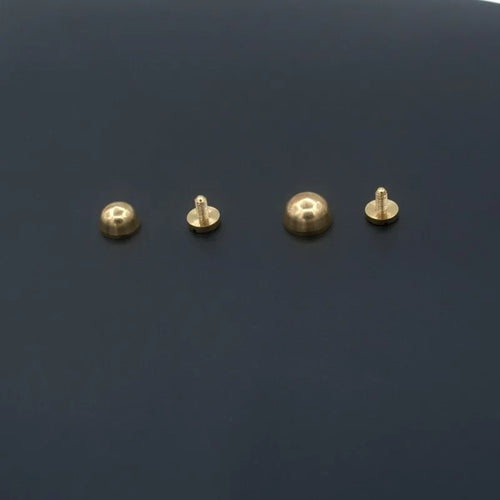 Brass decorative buckles showing round and bucket foot nail designs in 10x6mm and 12x7mm sizes