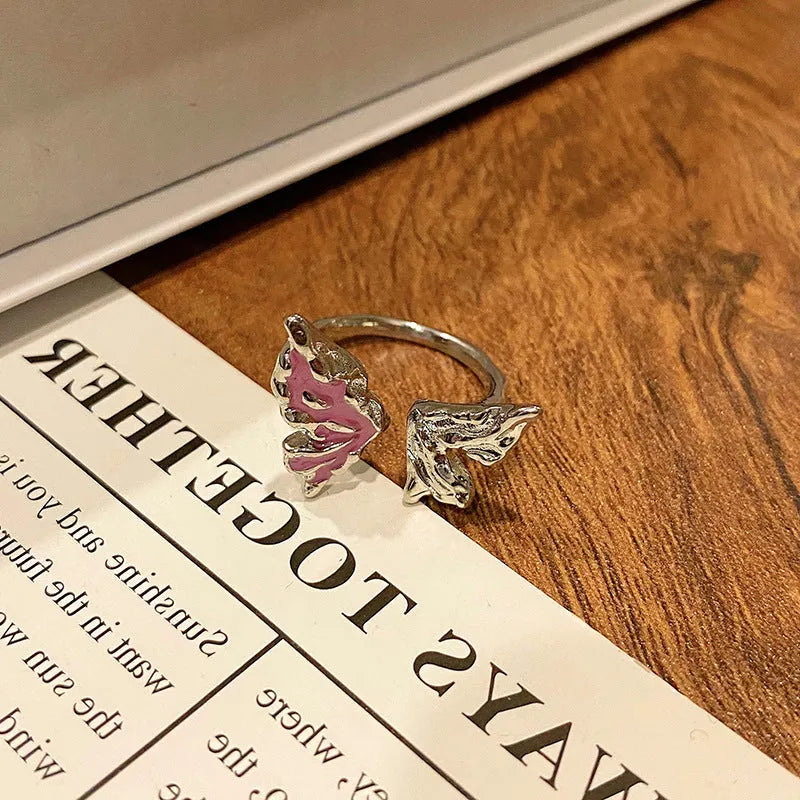 Butterfly design copper ring with oil-drip textured finish in women's jewellery