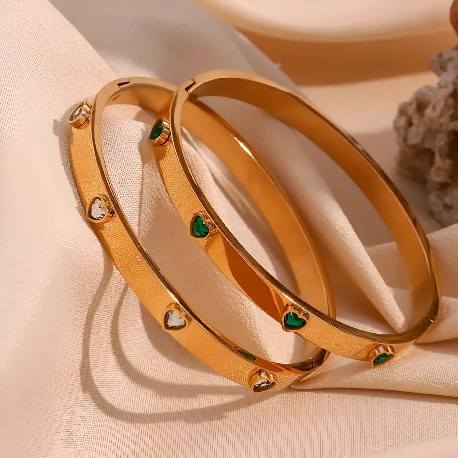 Stainless steel peach heart bracelet with micro-inlaid detail on a simple chain.