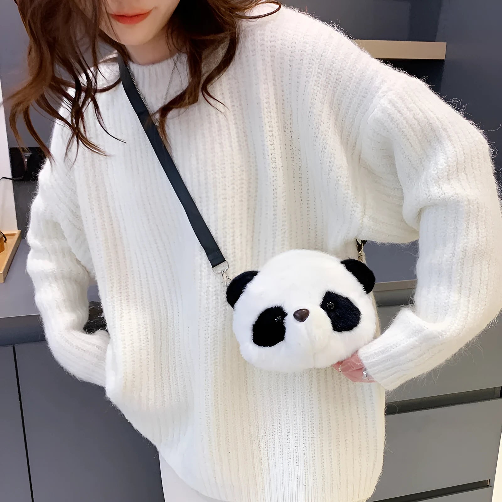 Plush panda head crossbody bag with cylindrical shape measuring 18cm wide
