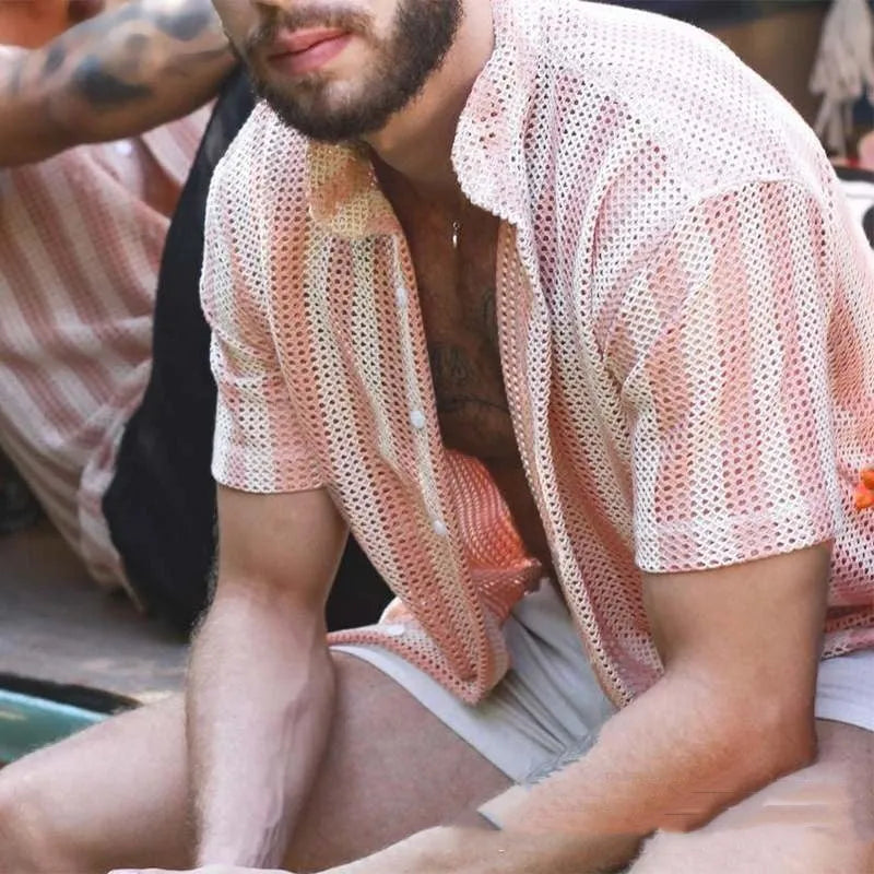 Pink men's loose-fit waffle texture short sleeve cardigan shirt on a hanger.