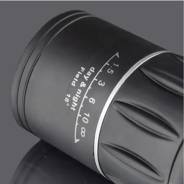 Black 16x52 high-power monocular with waterproof body and enhanced green film lenses.