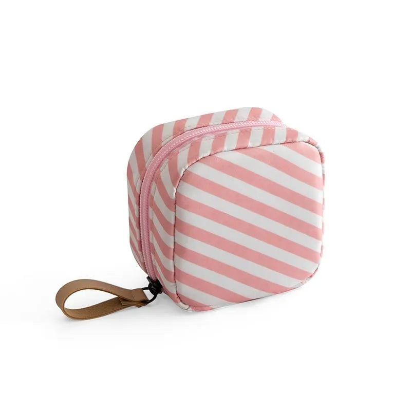 Blue cloth makeup storage bag with cube shape and plain pattern for cosmetics organisation