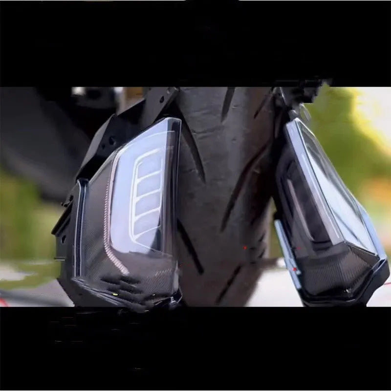 Pair of LED steering turn signal lights for Yamaha NMAX155 scooter in blue and yellow colour.