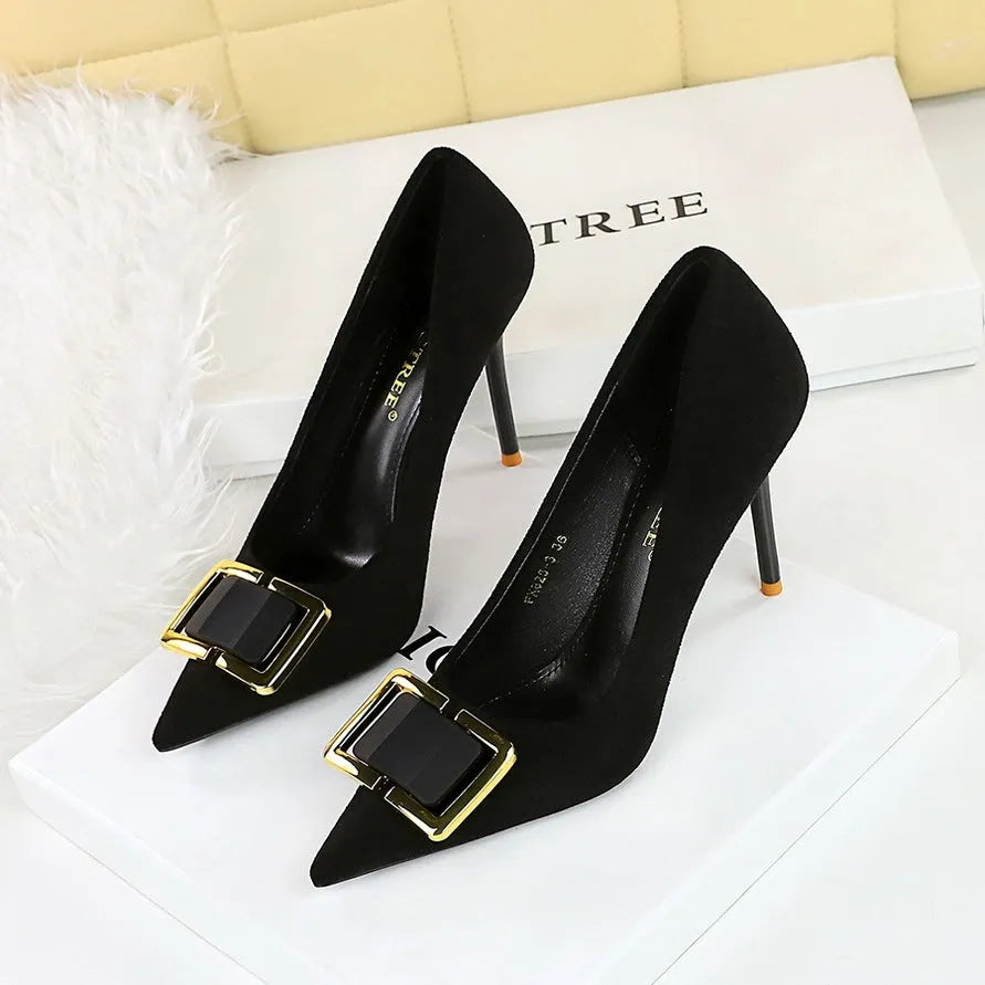 Black suede women's stiletto high heels with a pointed toe and thin 9cm heel.