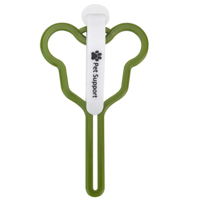 Hands-free dog poop bag holder with Velcro strap attached to a leash.