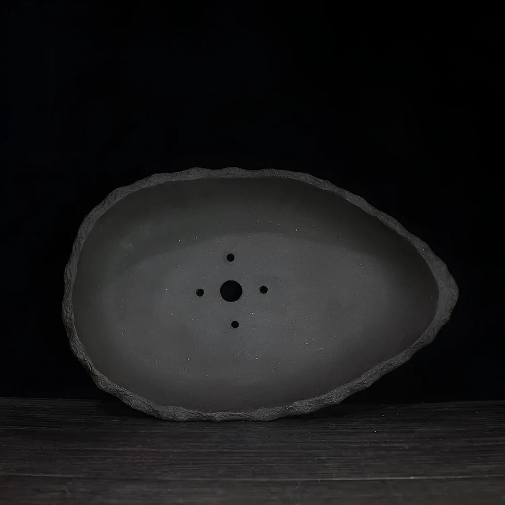 Handmade purple clay flower pot in floor-standing design with unique shape
