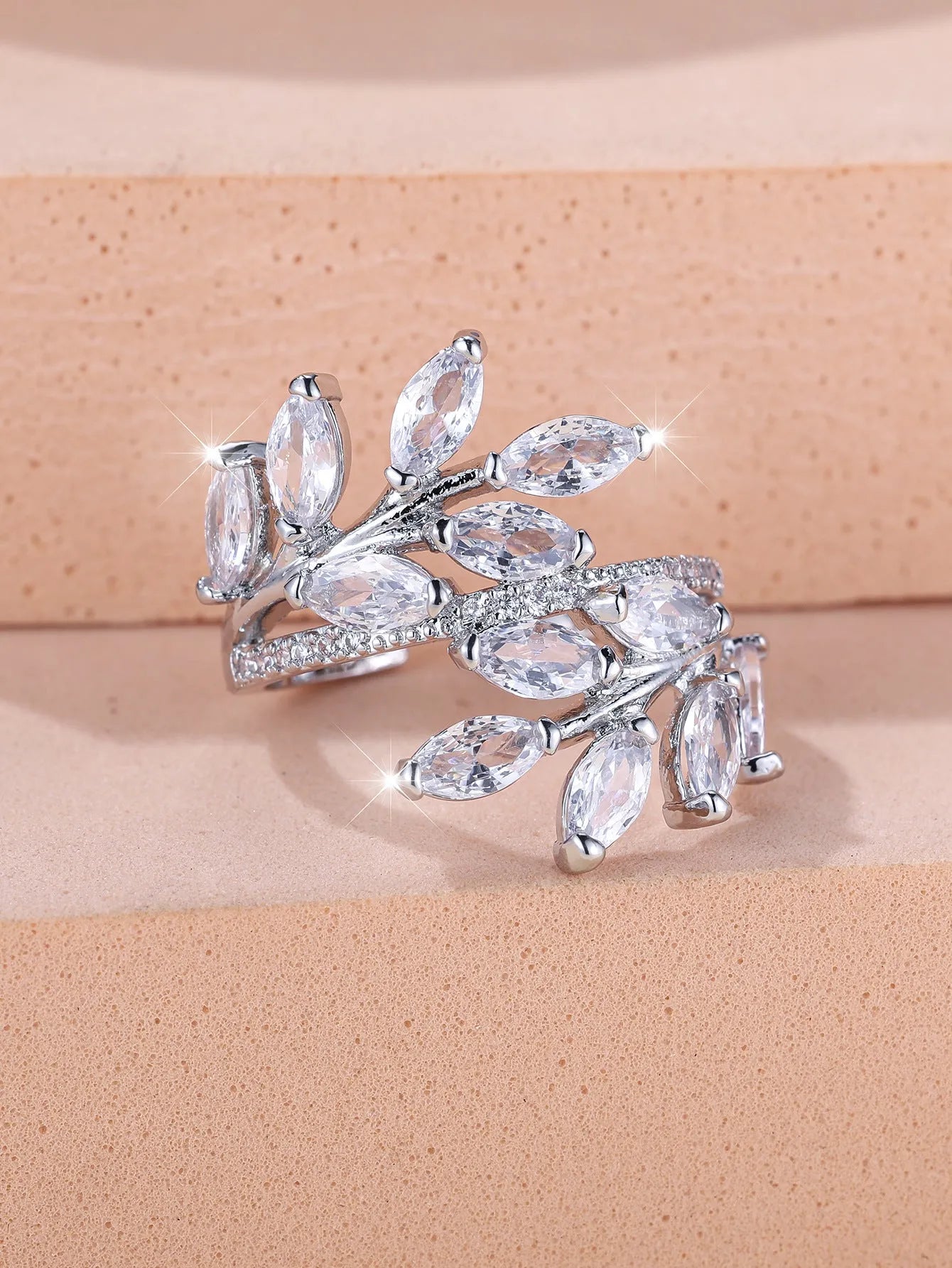 Adjustable copper leaf ring with horse eye zircon accents in multiple colour variations