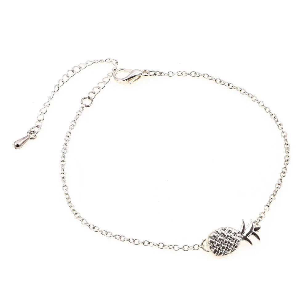 Women's alloy bracelet with pineapple charm in gold or silver tone