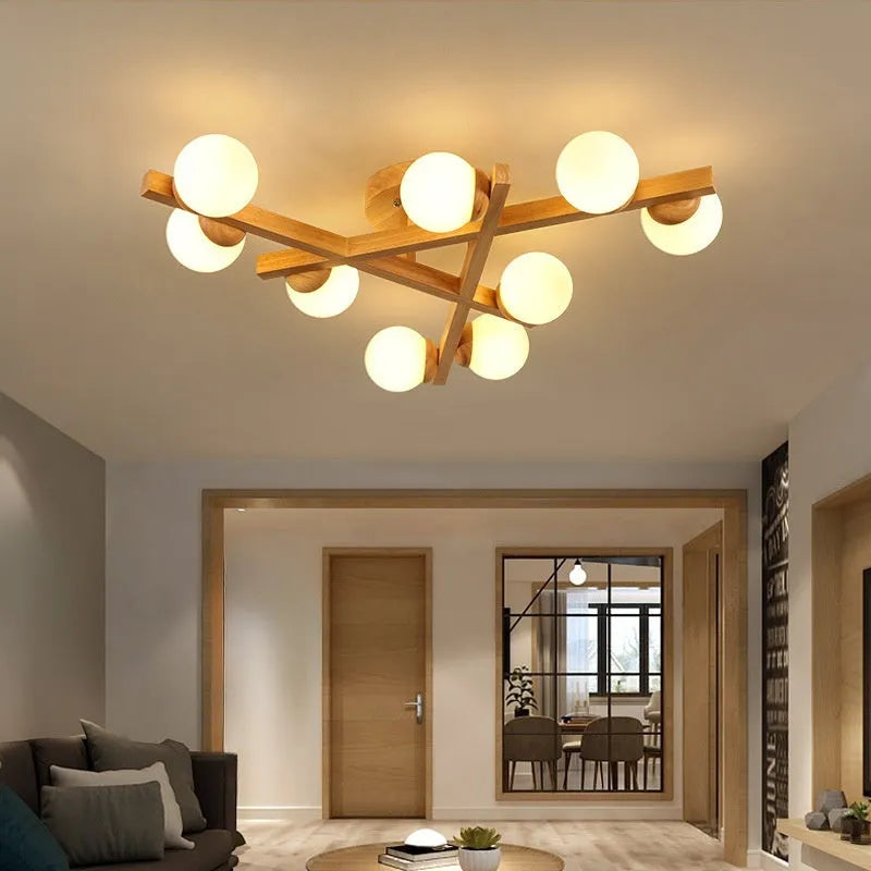 Wooden style modern Nordic ceiling light fixture with three neutral light heads.