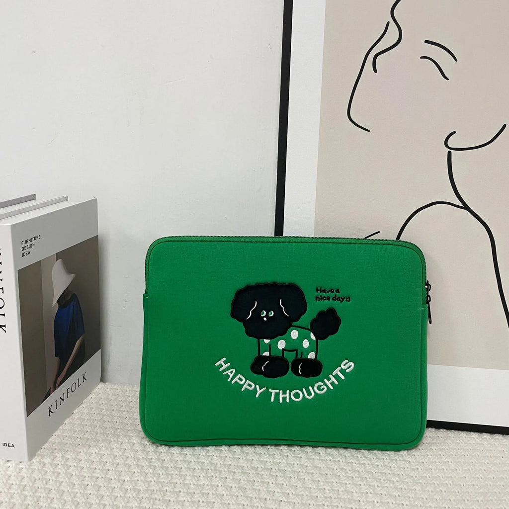 Embroidered animal design laptop liner bag in polyester fabric.