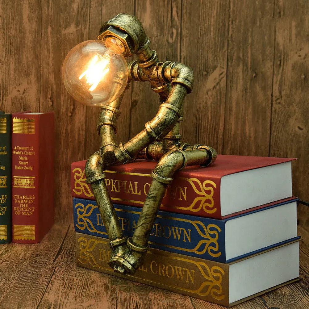 Vintage industrial robot table lamp with iron pipe design and water pipe light filtering