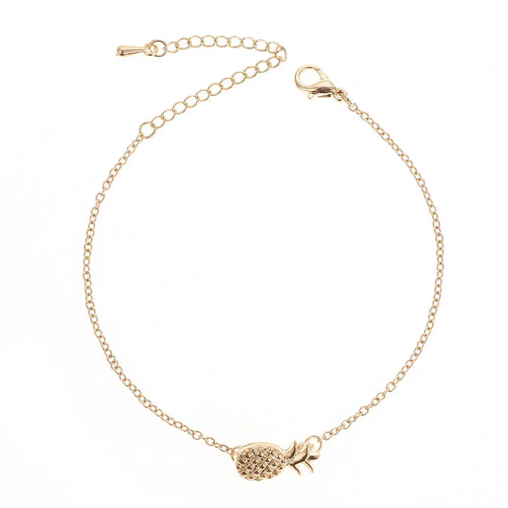 Women's alloy bracelet with pineapple charm in gold or silver tone