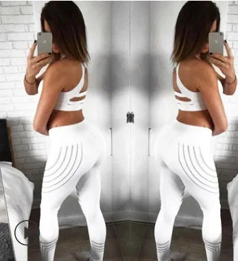 Women's black and white milk silk fitness leggings with glowing print patterns, slim fit full-length design.