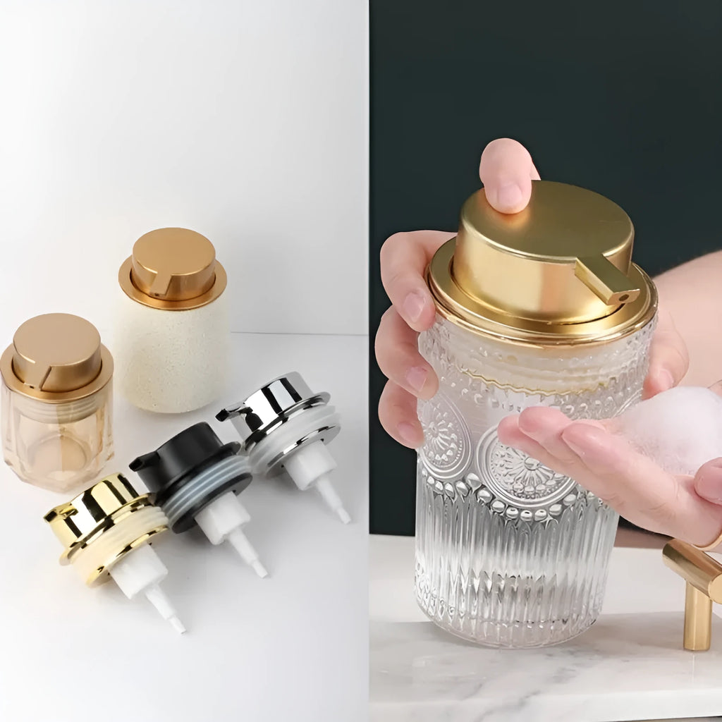 Foam pump facial cleanser dispenser with large plastic pump head in metallic finish