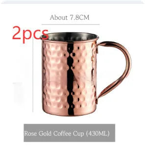 Stainless steel Moscow Mule cup with copper plating in hammer point style showing metallic finish.