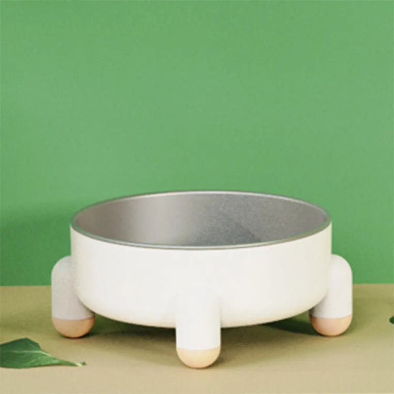 Stainless steel pet bowl with high foot and non-slip base in green, pink, or white colour