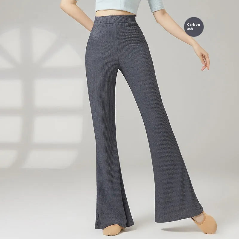 Women's solid colour classical dance practice pants in polyester fabric shown in beige apricot.