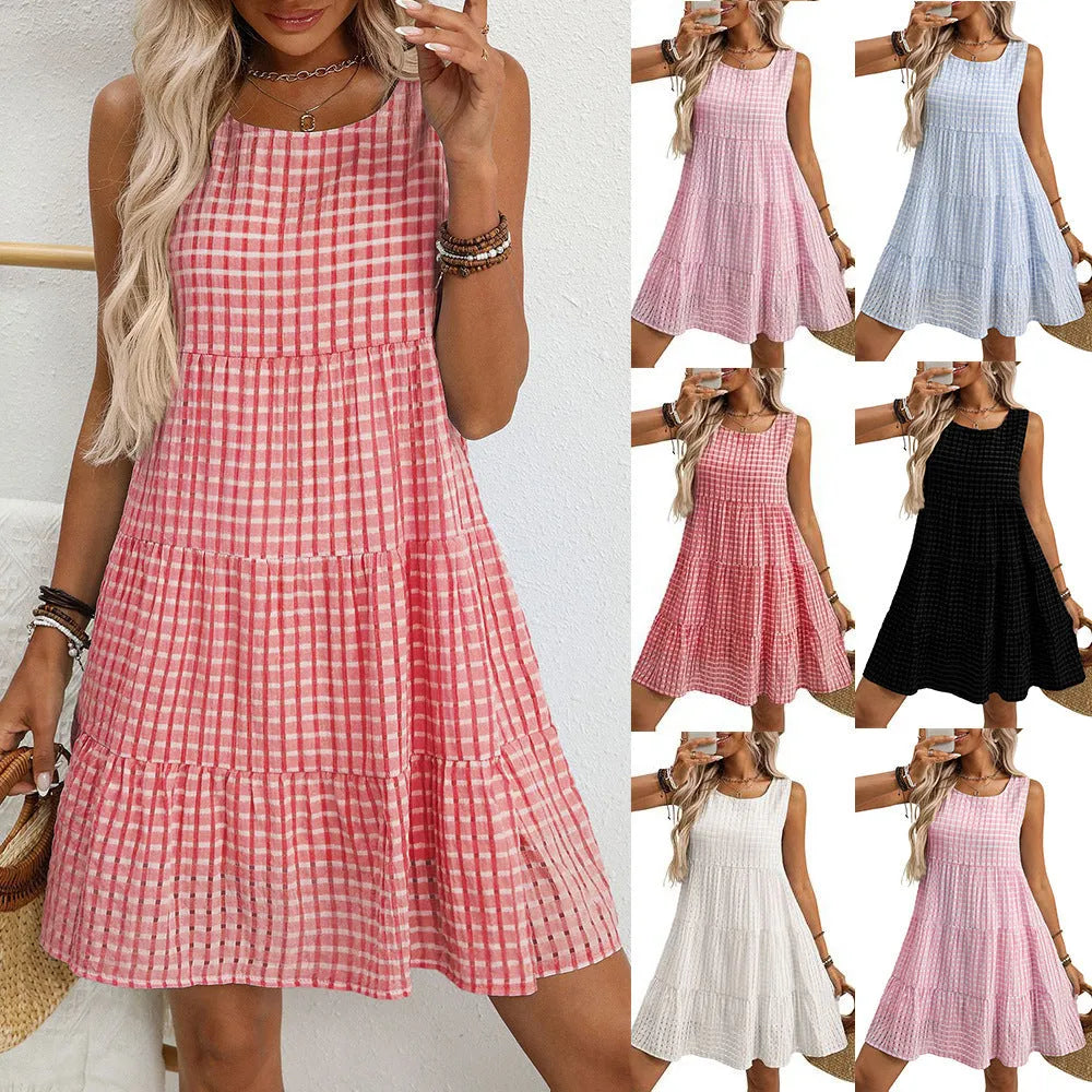 Women's light blue sleeveless plaid dress with an oversized swing skirt and high waist.