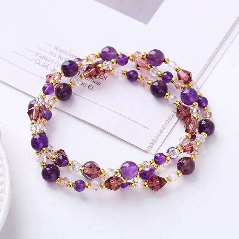 Women's adjustable three-ring crystal bracelet with colourful gemstones on wrist