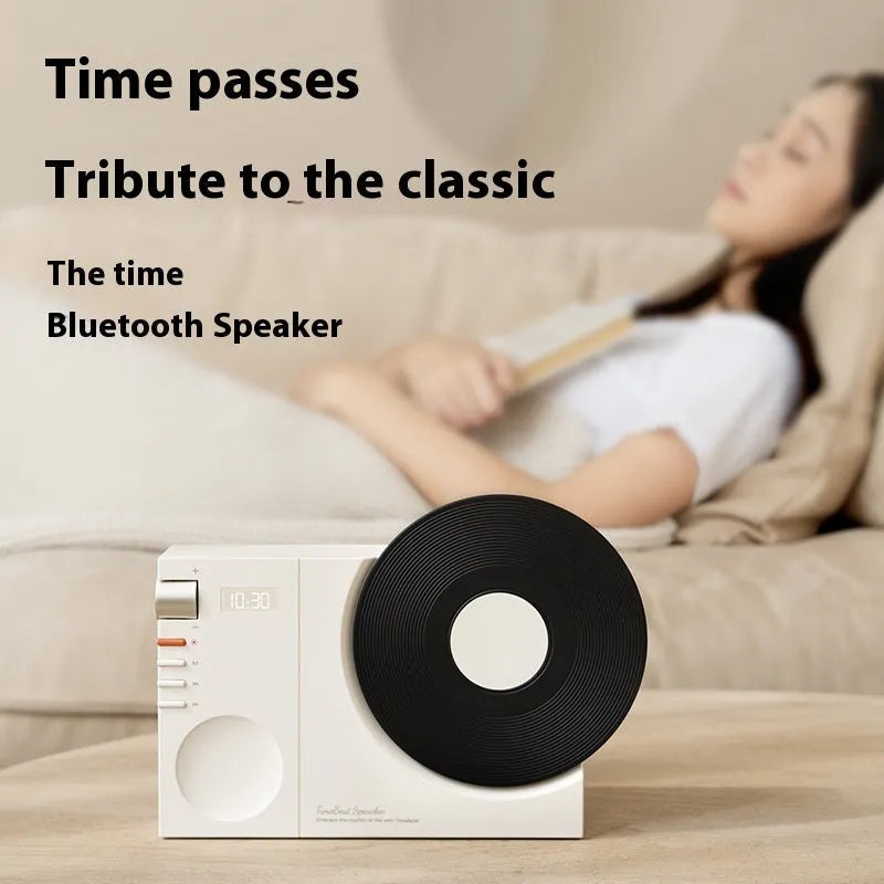 Mini Bluetooth portable speaker in coral pink with USB cable and gift bag