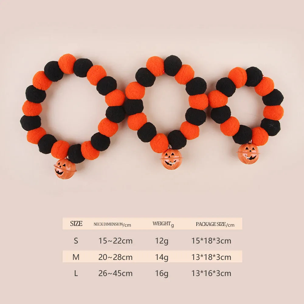 Orange and black Halloween pumpkin pet collar with jingle bell and buckle fastener for cats and dogs