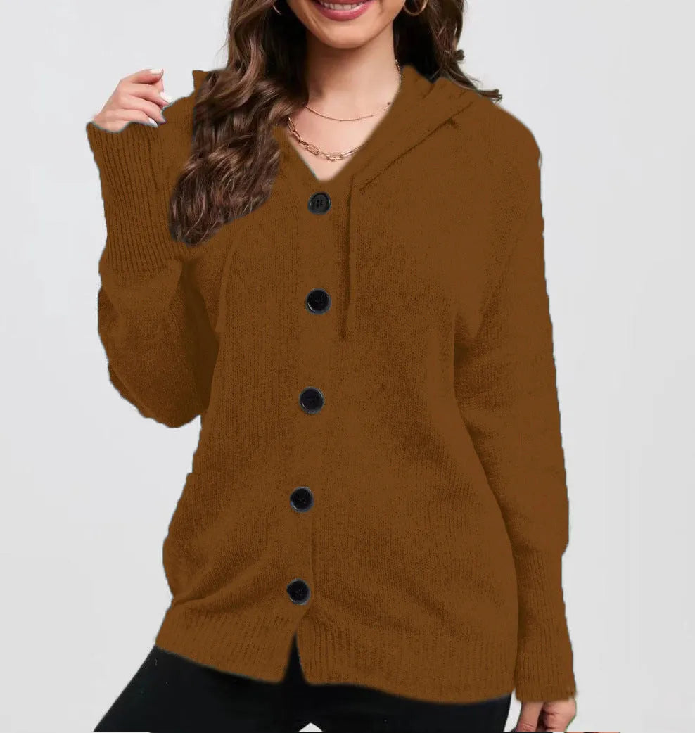 Women's solid colour loose-fit hooded cotton cardigan sweater on a hanger.