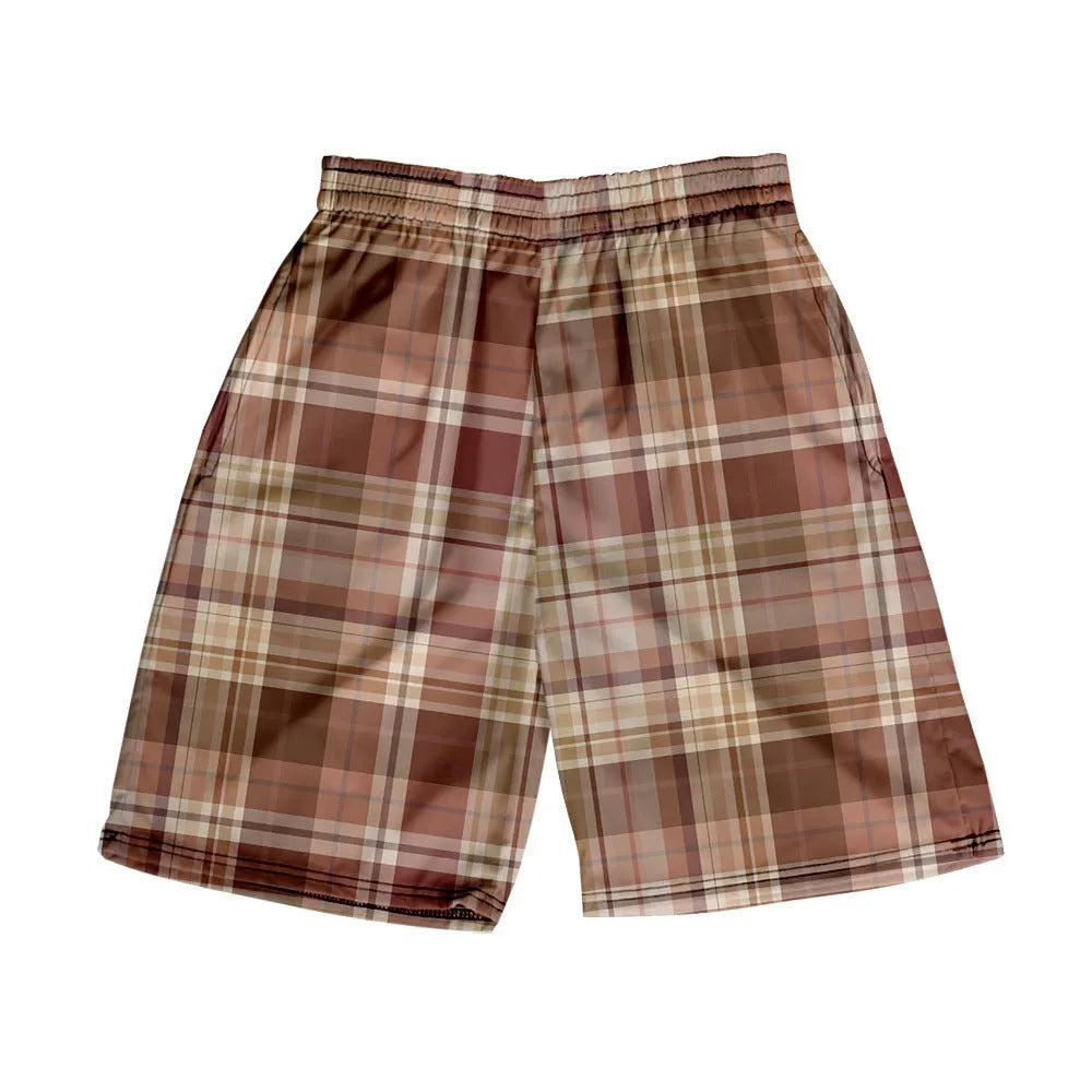 Man wearing plaid patterned polyester shorts with an elastic waistband, showcasing one of the twenty available colour options.