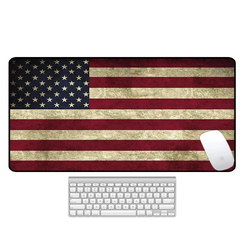 Large natural rubber desk pad with graphic print, showing non-slip base and size options for mouse and keyboard.