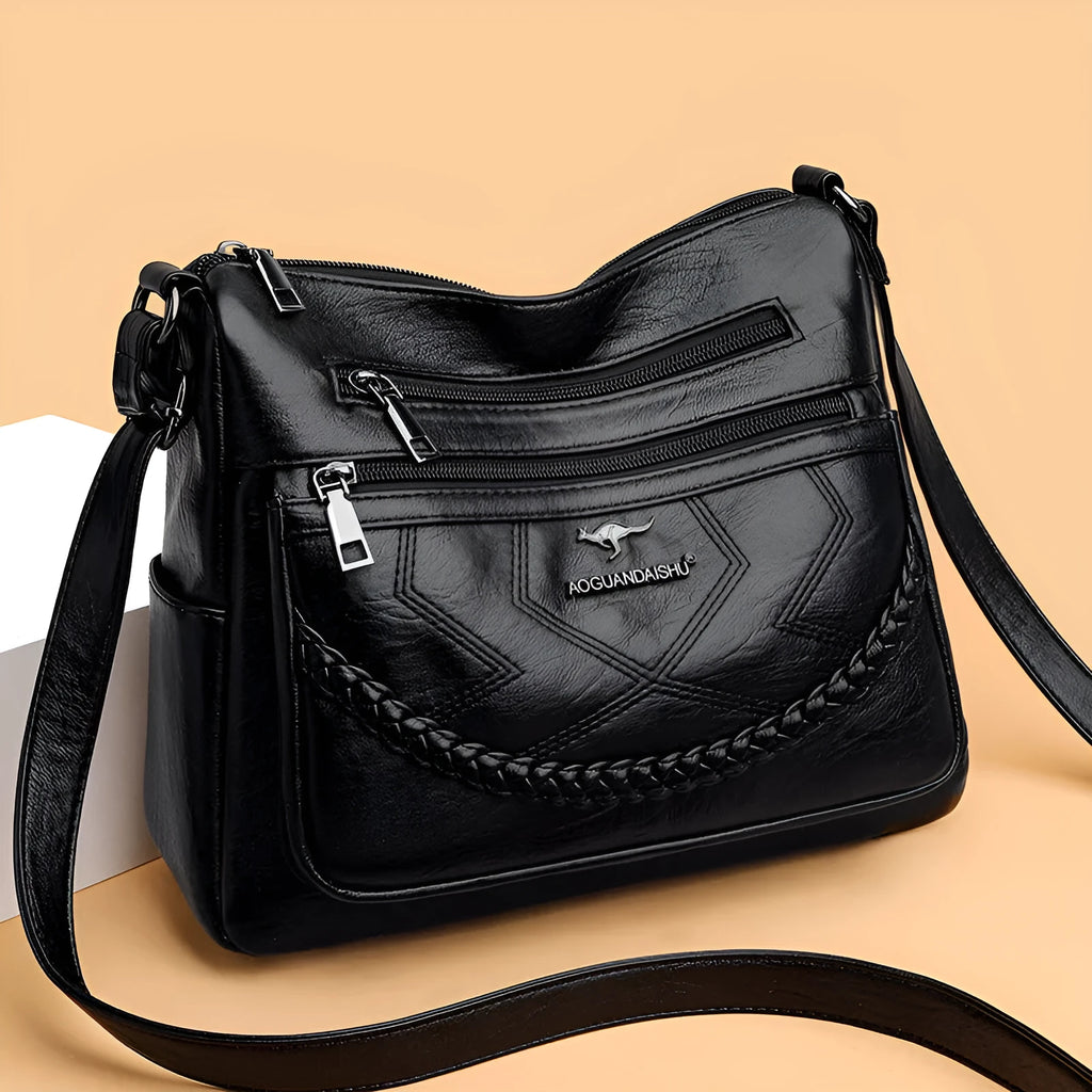 Soft PU leather crossbody shoulder bag in horizontal square shape with crossbody strap