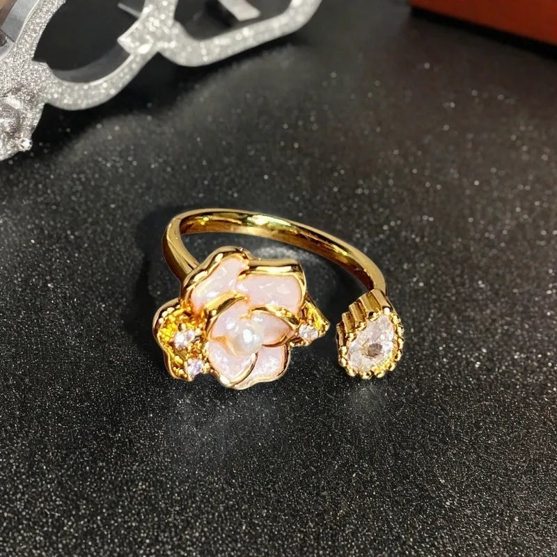 Copper adjustable ring with gourd design, flower and bow shapes, inlaid zircon detailing