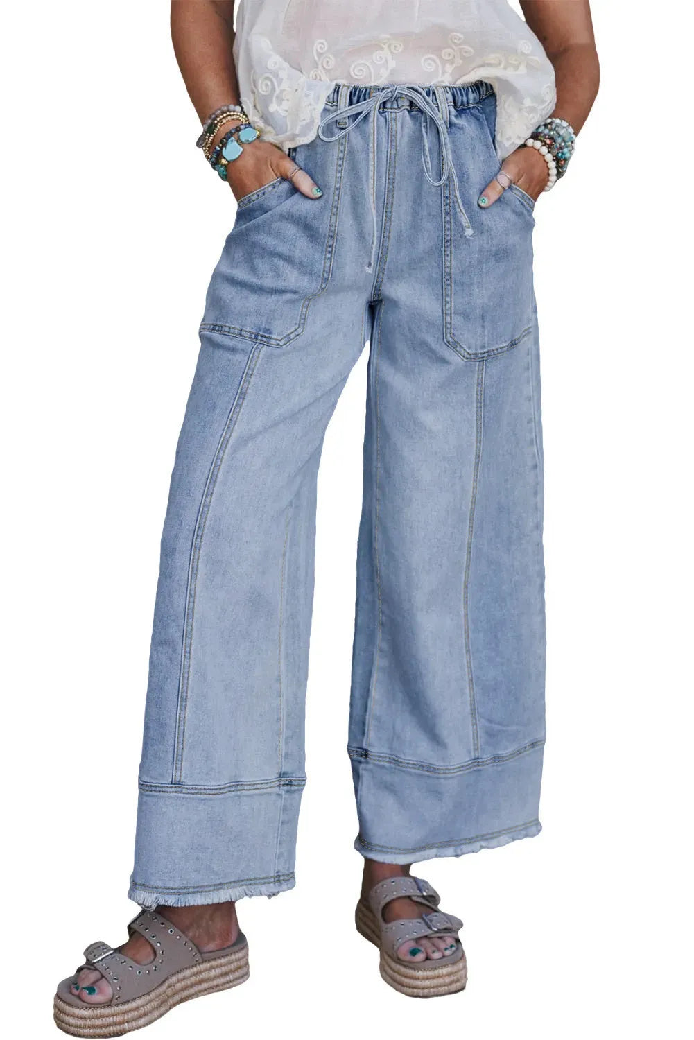 Beau Blue women's wide leg denim trousers with drawstring waist and raw hem.