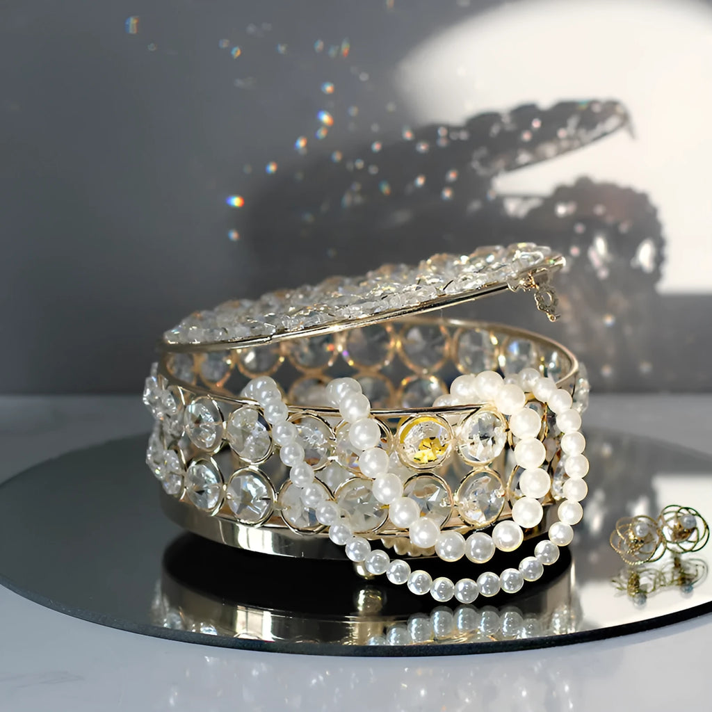 French gold European style jewellery storage box with transparent crystal glass sides and lid.