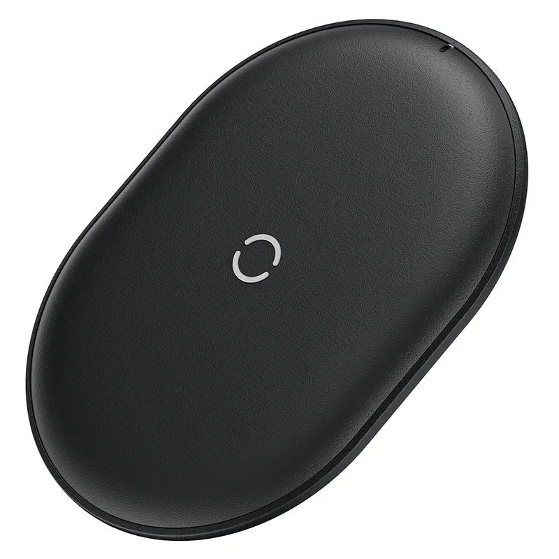 Baseus rough-textured 15W wireless charging pad for mobile phones in black on a desk.