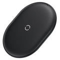 Baseus rough-textured 15W wireless charging pad for mobile phones in black on a desk.