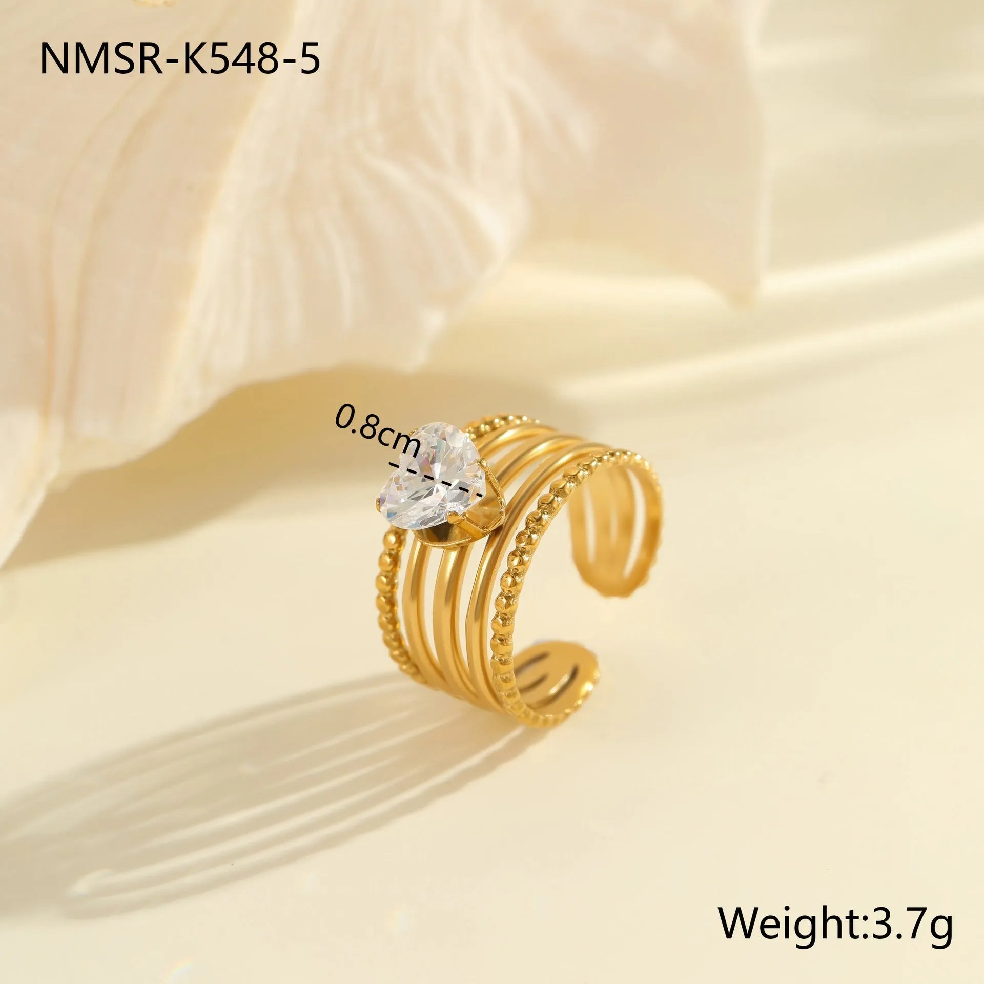 Gold electroplated stainless steel ring with zircon stones and open mouth adjustable design