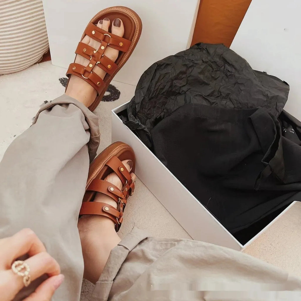 Women's retro Roman style sandal slippers in patent leather, shown in black, white, and brown colour options.