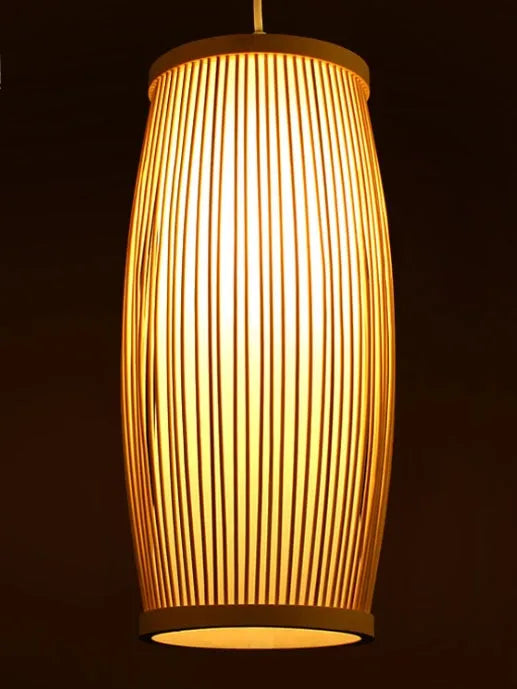 Natural bamboo plait decoration lamp with woven shade, shown with dimensions 15cm wide by 35cm tall.