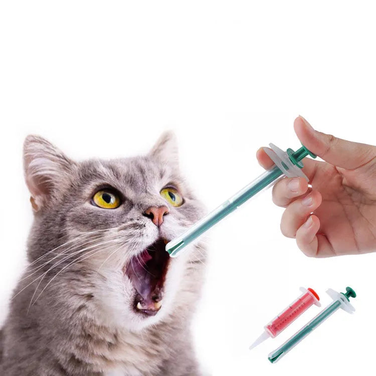 Two pet pill shooters with soft silicone tips for cat and dog medication administration