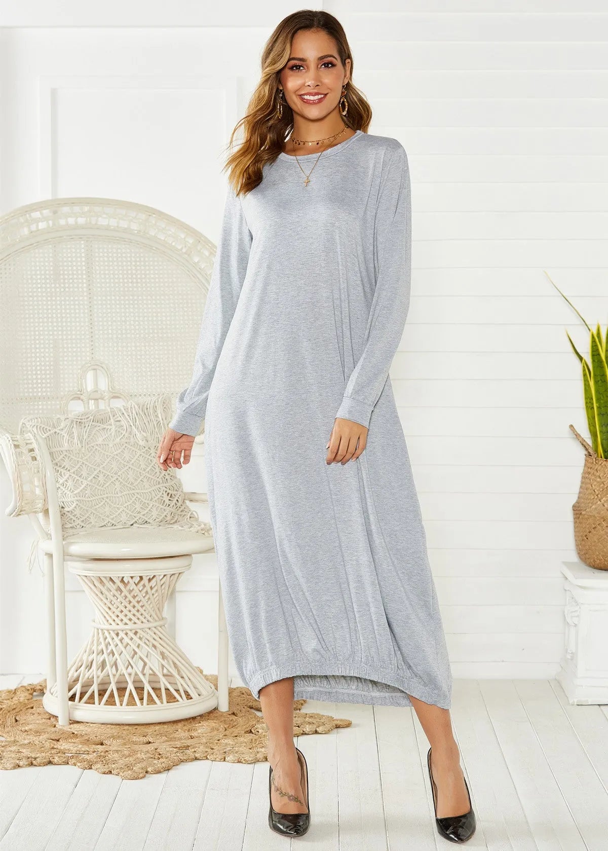 Women's black lantern dress with lace-up crew neck and loose silhouette