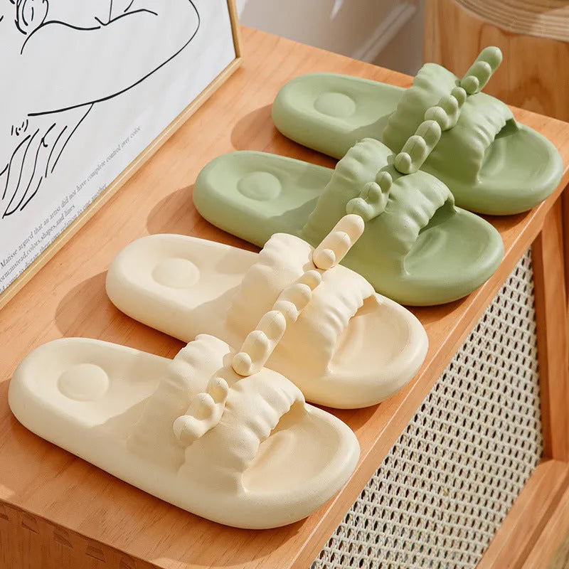 White women's flip flop slippers with deer horn design and hollow-out EVA upper on a light background.