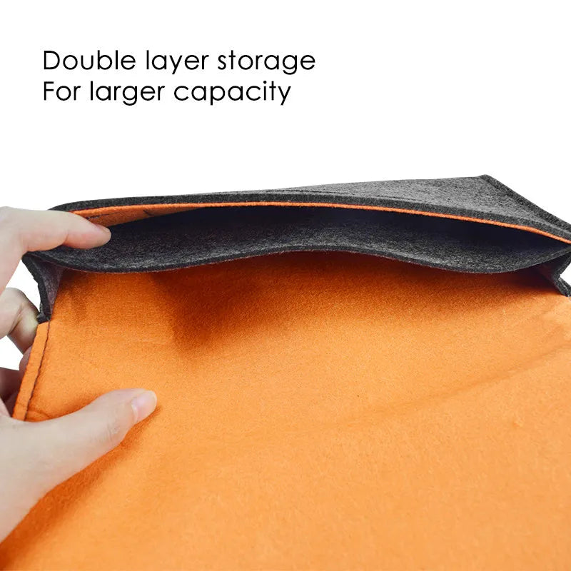 Black felt Nintendo Switch pouch with game card slots and double storage compartments